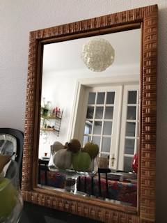 Miroir rectangulaire osier, en parfait état, dimensions: L 40 cm, H 55,5 cm, P 2,5 cm.