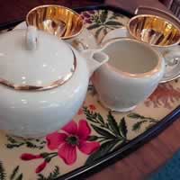 Tête à tête faience St Clément, cafétère sucrier crémier 2 tasses + soucoupes.